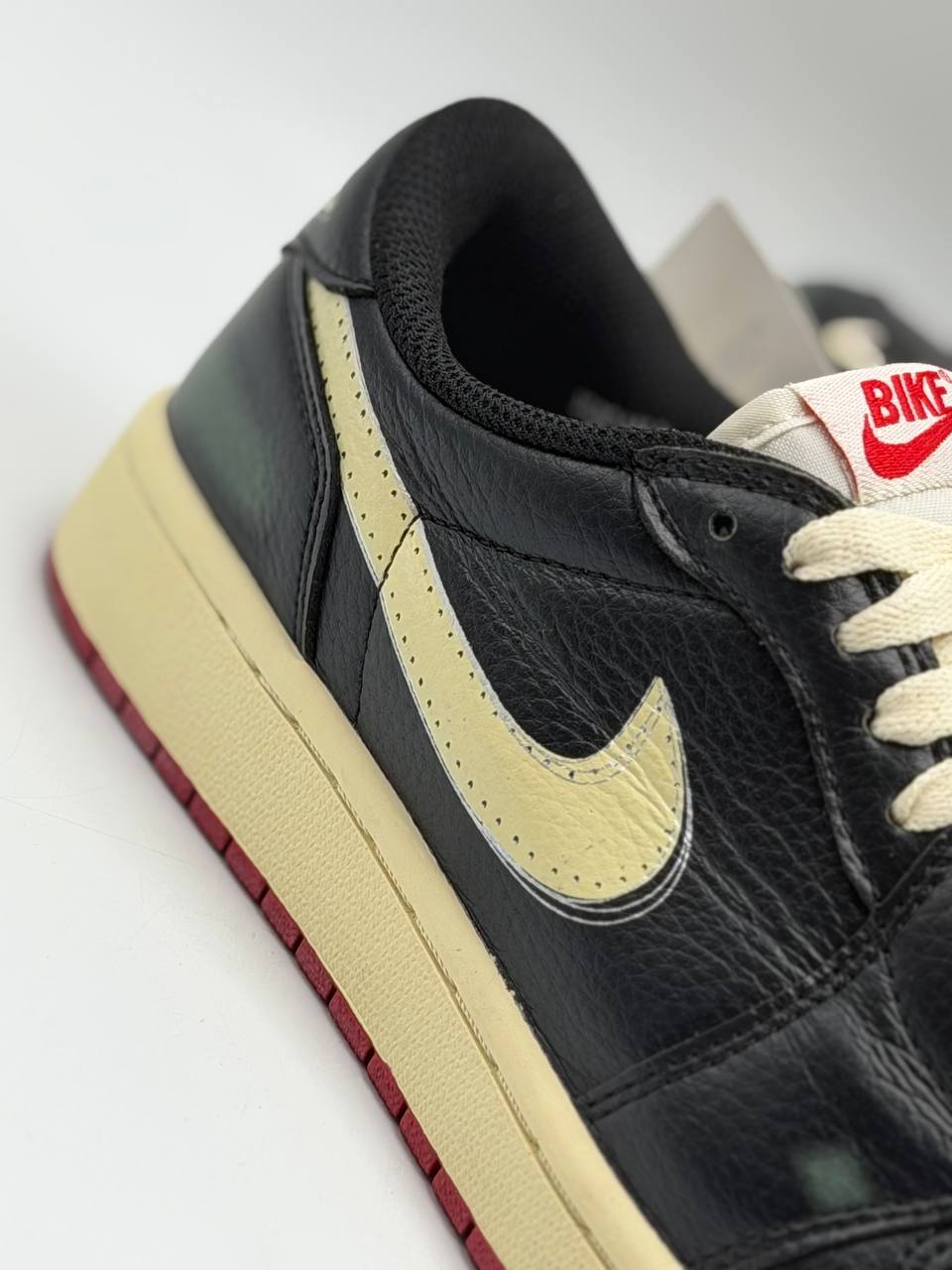 Jordan 1 Retro Low OG 'Nigel Sylvester Better With Time' | Rojo-Negro