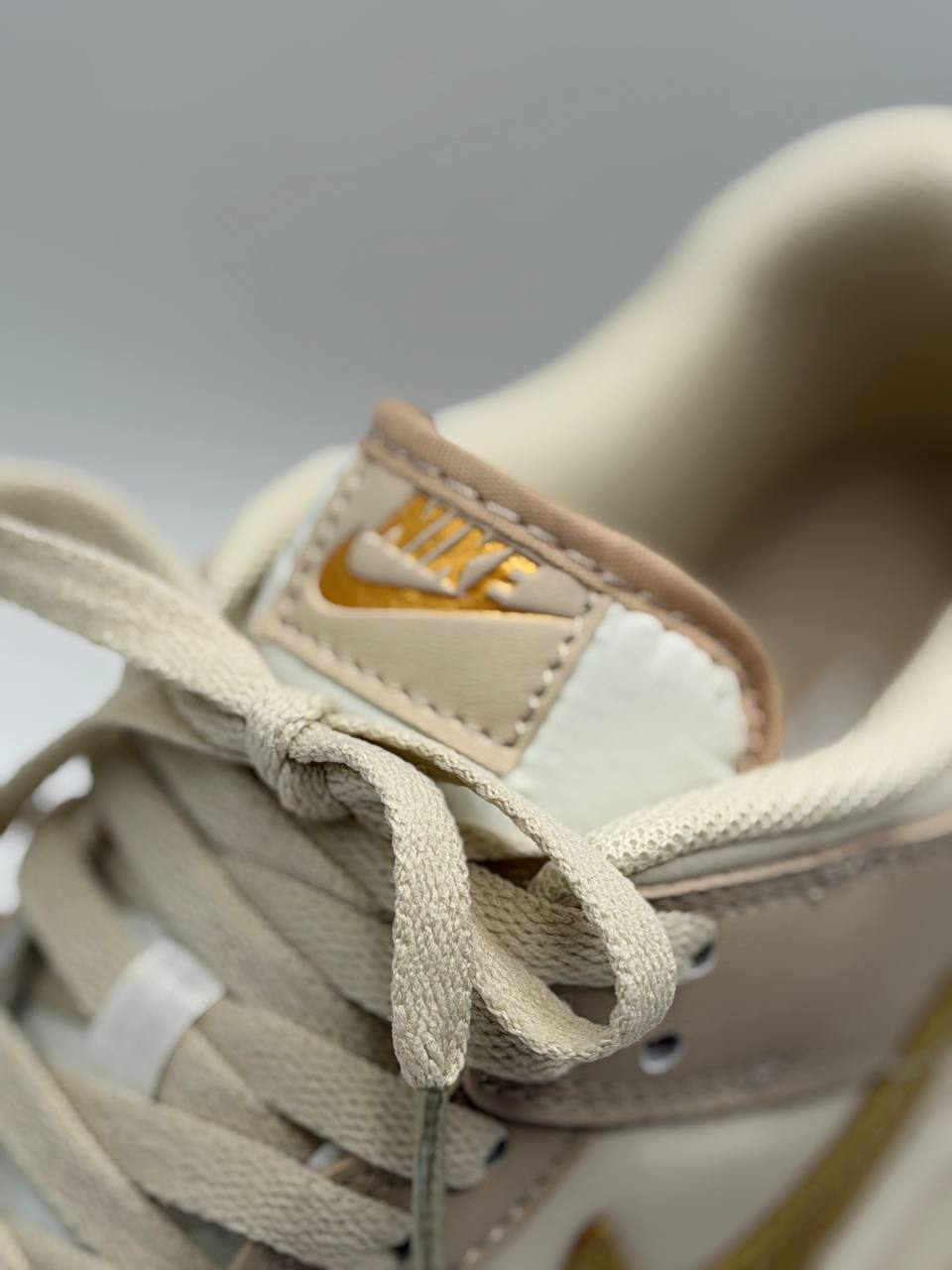 Nike Dunk Low Gold Swoosh | Beige